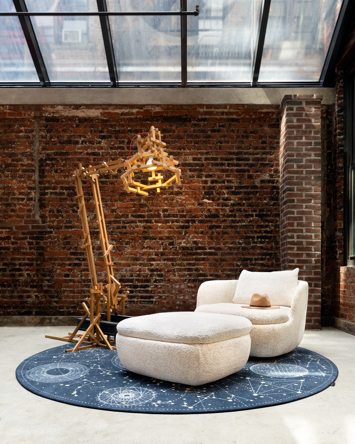 Interior of New York Showroom with Brave New World floor lamp, Bart Armchair and Moooi Carpet